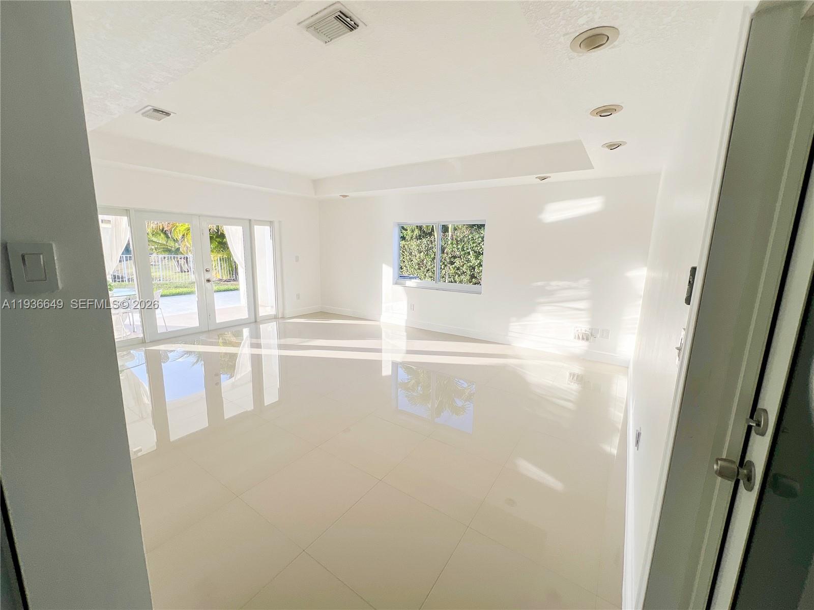 3884 Southwest 150th Court Miami, FL 33185 - Photo 12 of 45 a view of empty room with window