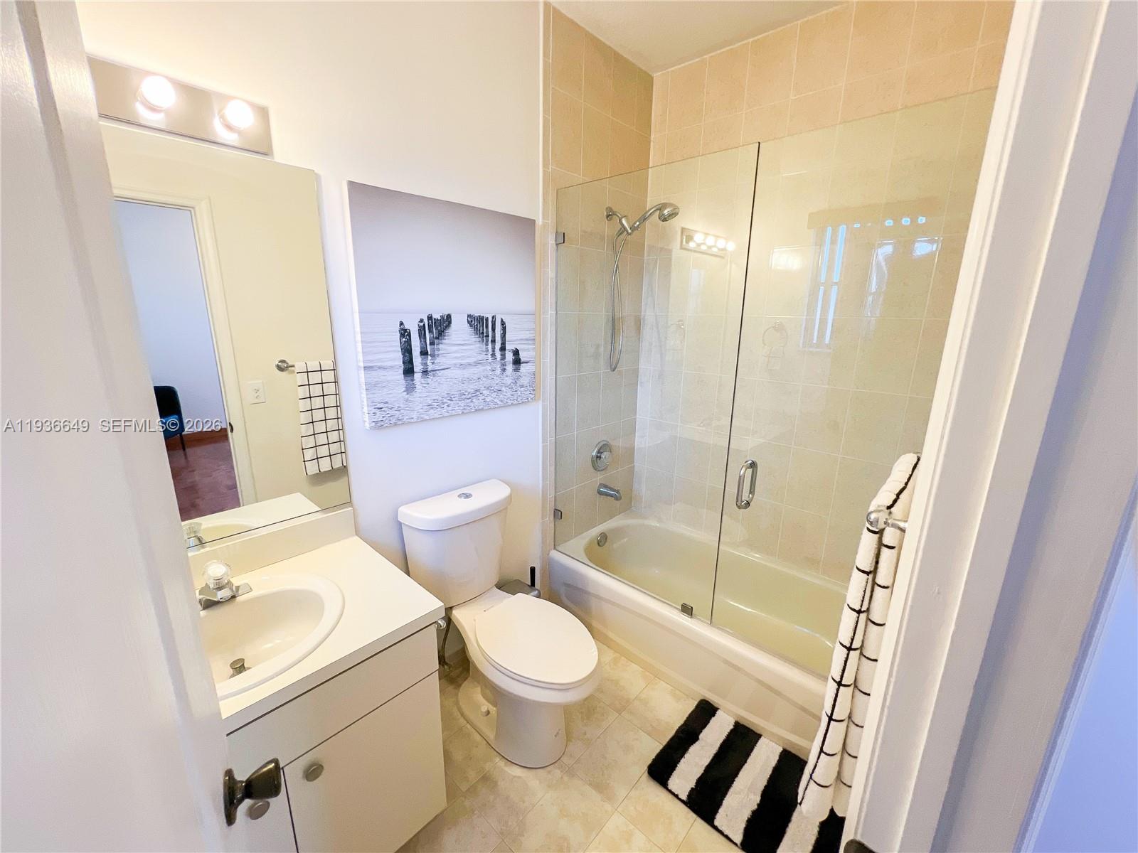 3884 Southwest 150th Court Miami, FL 33185 - Photo 30 of 45 a bathroom with a toilet and a shower