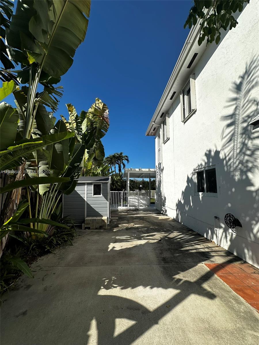3884 Southwest 150th Court Miami, FL 33185 - Photo 35 of 45 a view of a street with houses