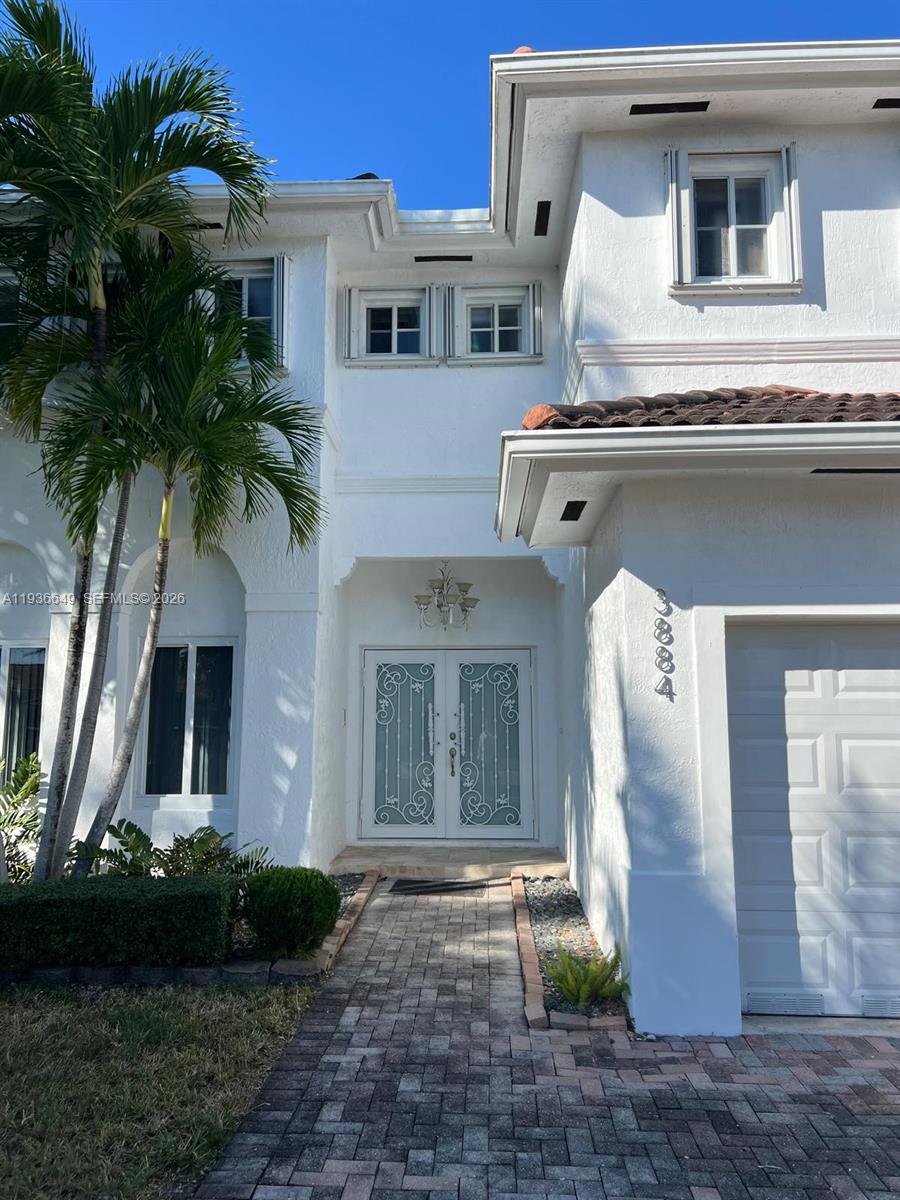 3884 Southwest 150th Court Miami, FL 33185 - Photo 5 of 45 a front view of a house with garden