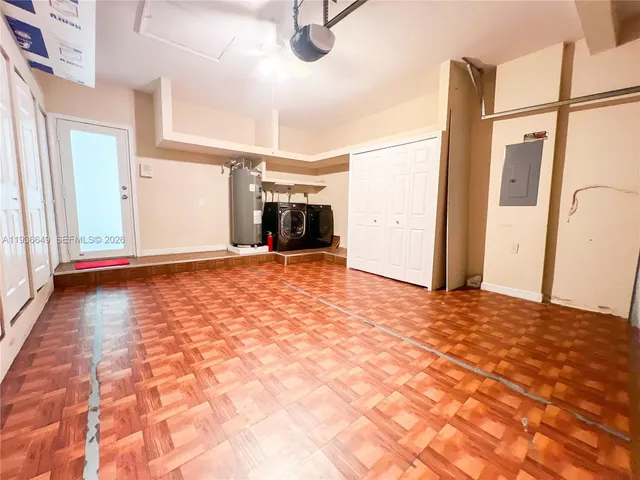 a view of a livingroom with wooden floor
