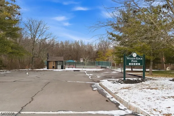 a view of a yard covered in snow