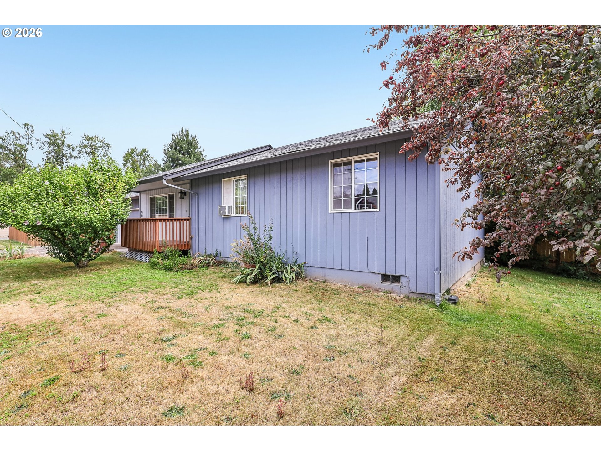 608 Southeast Sumner Street Camas, WA 98607 - Photo 27 of 39 a backyard of a house with lots of green space