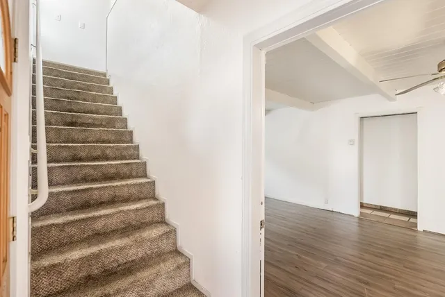 a view of entryway with wooden floor