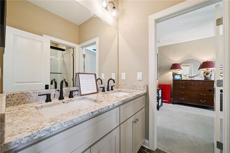 2755 Rustic Lk Terrace Cumming, GA 30041 - Photo 103 of 141 a bathroom with a granite countertop double vanity sink and a mirror