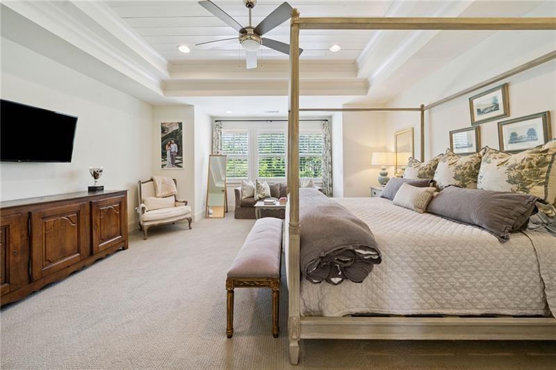 2755 Rustic Lk Terrace Cumming, GA 30041 - Photo 116 of 141 a bedroom with a bed and flat screen tv