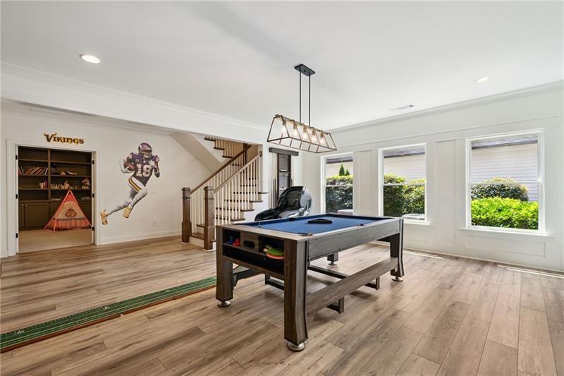 2755 Rustic Lk Terrace Cumming, GA 30041 - Photo 123 of 141 a view of a livingroom with furniture window and wooden floor