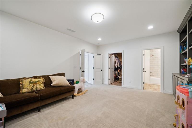2755 Rustic Lk Terrace Cumming, GA 30041 - Photo 131 of 141 a living room with furniture and a couch