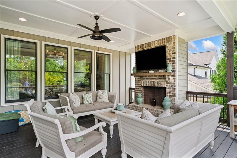 2755 Rustic Lk Terrace Cumming, GA 30041 - Photo 134 of 141 a living room with fireplace furniture and a flat screen tv