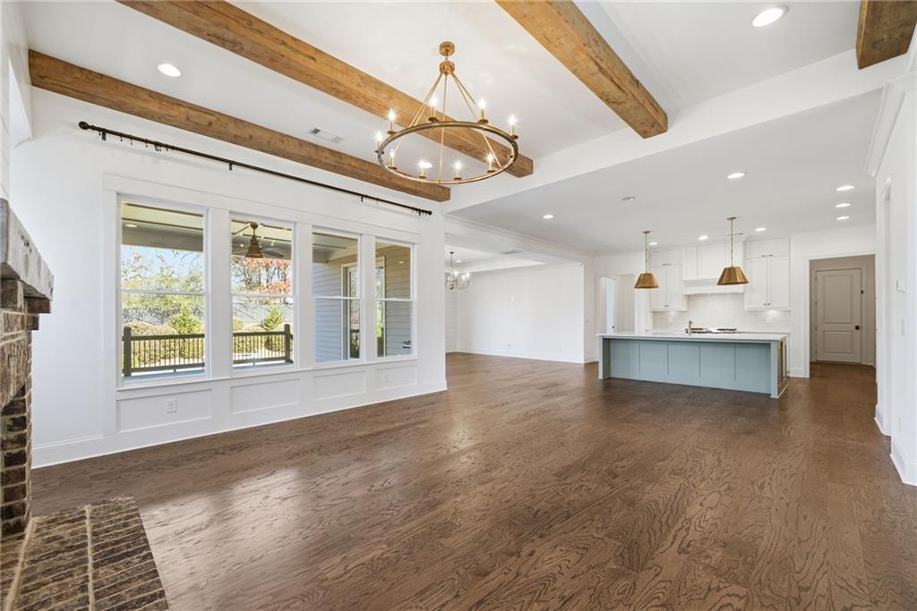 2755 Rustic Lk Terrace Cumming, GA 30041 - Photo 24 of 141 a view of an empty room with a kitchen
