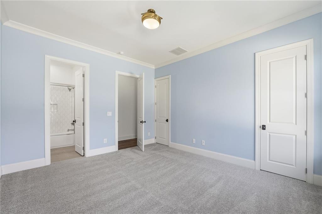 2755 Rustic Lk Terrace Cumming, GA 30041 - Photo 34 of 141 a view of an empty room and a window
