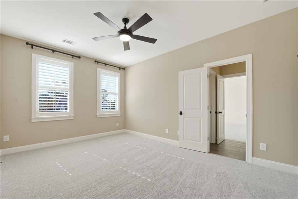 2755 Rustic Lk Terrace Cumming, GA 30041 - Photo 48 of 141 a view of an empty room with a window