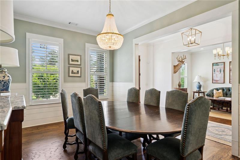 2755 Rustic Lk Terrace Cumming, GA 30041 - Photo 78 of 141 a view of a dining room with furniture window and wooden floor