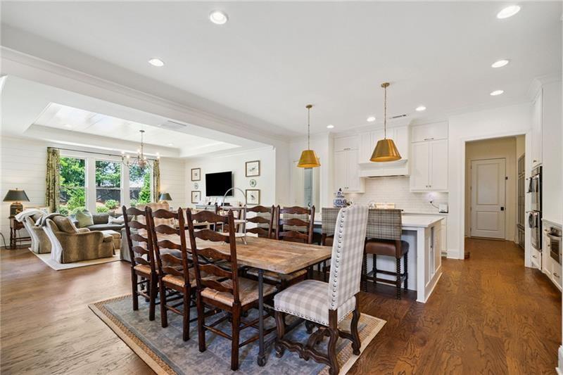 2755 Rustic Lk Terrace Cumming, GA 30041 - Photo 87 of 141 a view of a dining room with furniture window and wooden floor