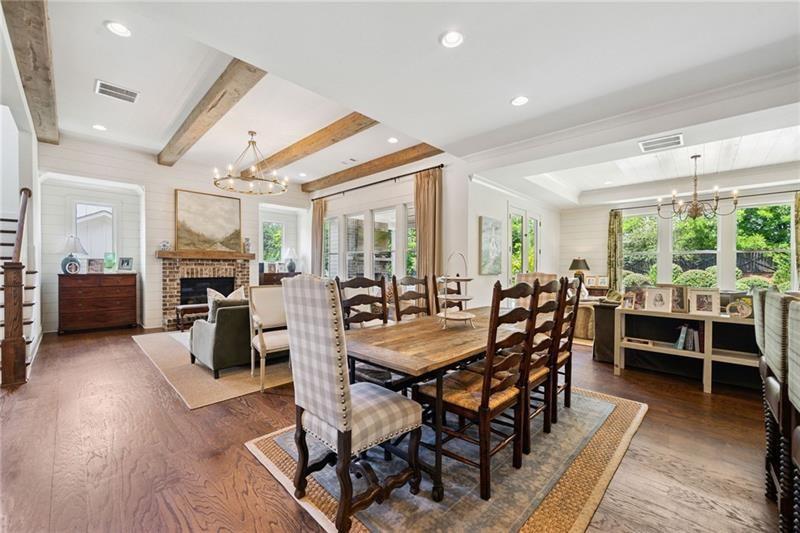 2755 Rustic Lk Terrace Cumming, GA 30041 - Photo 89 of 141 a view of a dining room with furniture and wooden floor