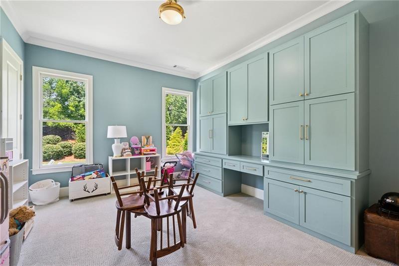 2755 Rustic Lk Terrace Cumming, GA 30041 - Photo 99 of 141 a view of a dining room with furniture and window