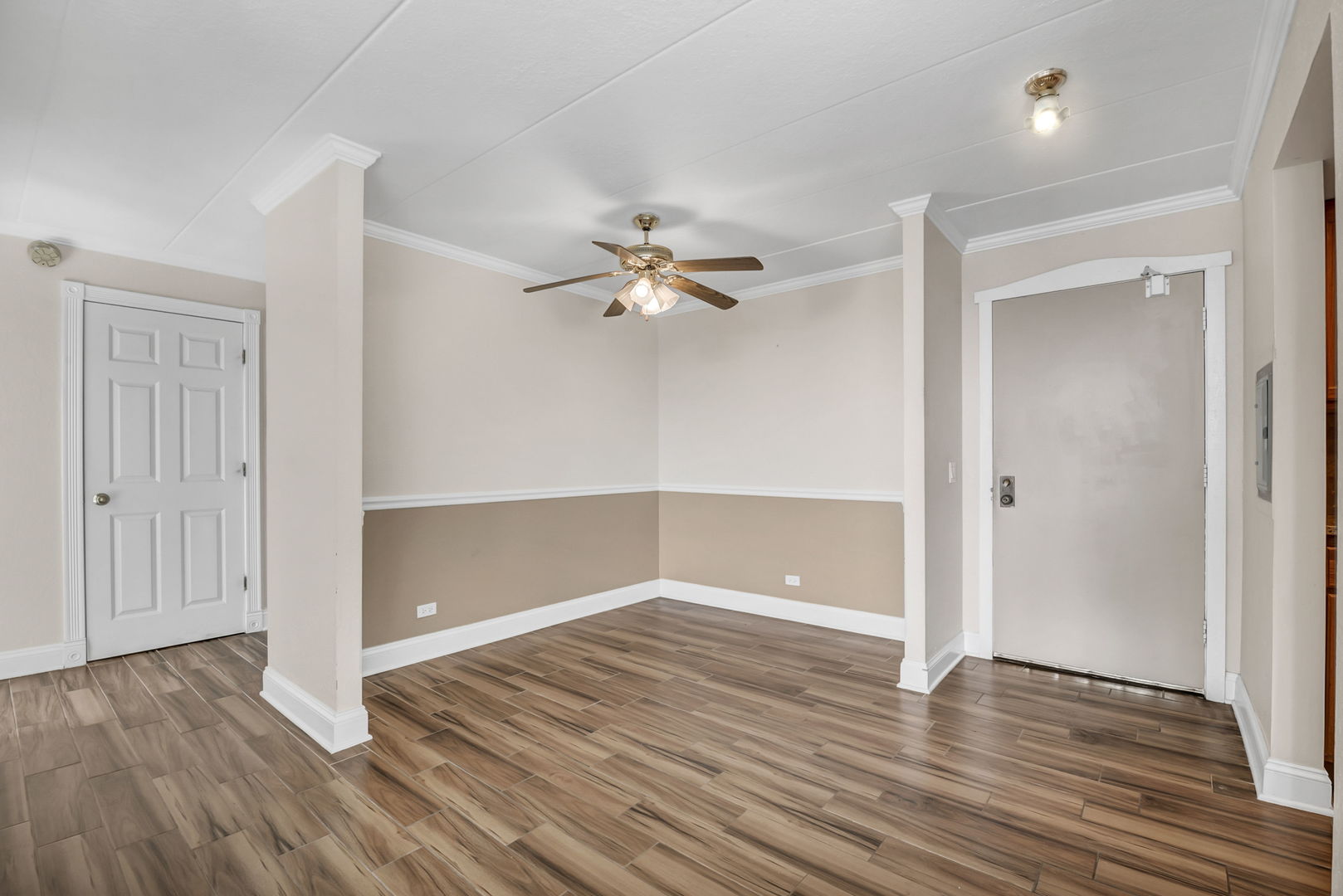 1 Renaissance Place, Unit 911 Palatine, IL 60067 - Photo 4 of 17 wooden floor in an empty room with a window