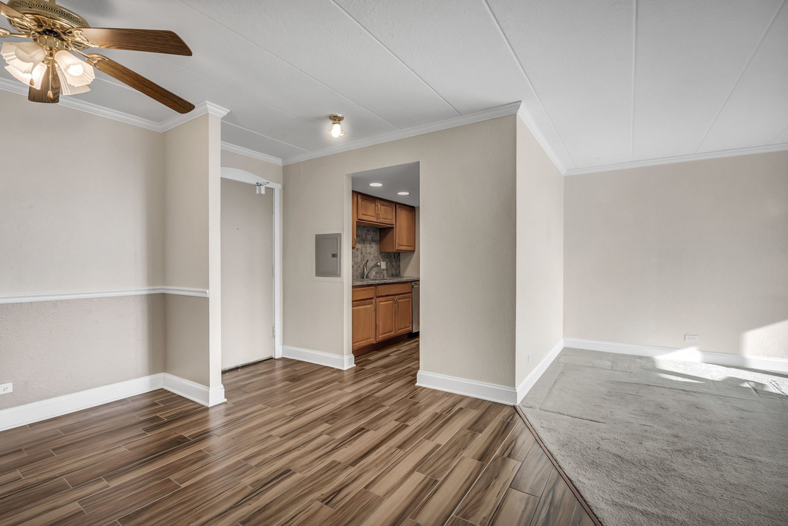 1 Renaissance Place, Unit 911 Palatine, IL 60067 - Photo 6 of 17 a view of a room with wooden floor and bathroom
