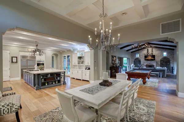 a kitchen with a sink cabinets and appliances