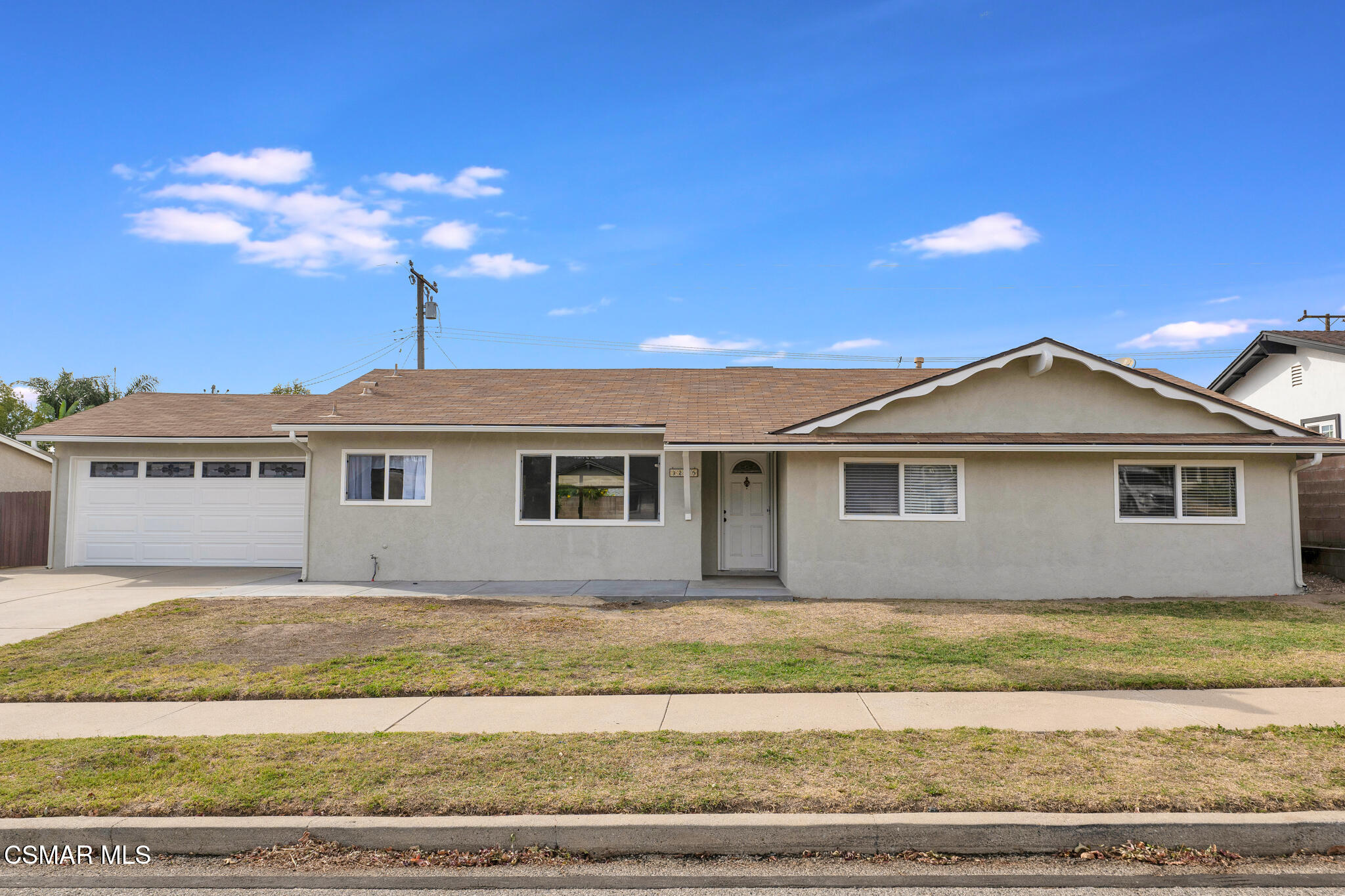 3235 Amarillo Avenue Simi Valley, CA 93063 - Photo 54 of 61 a front view of a house with a yard