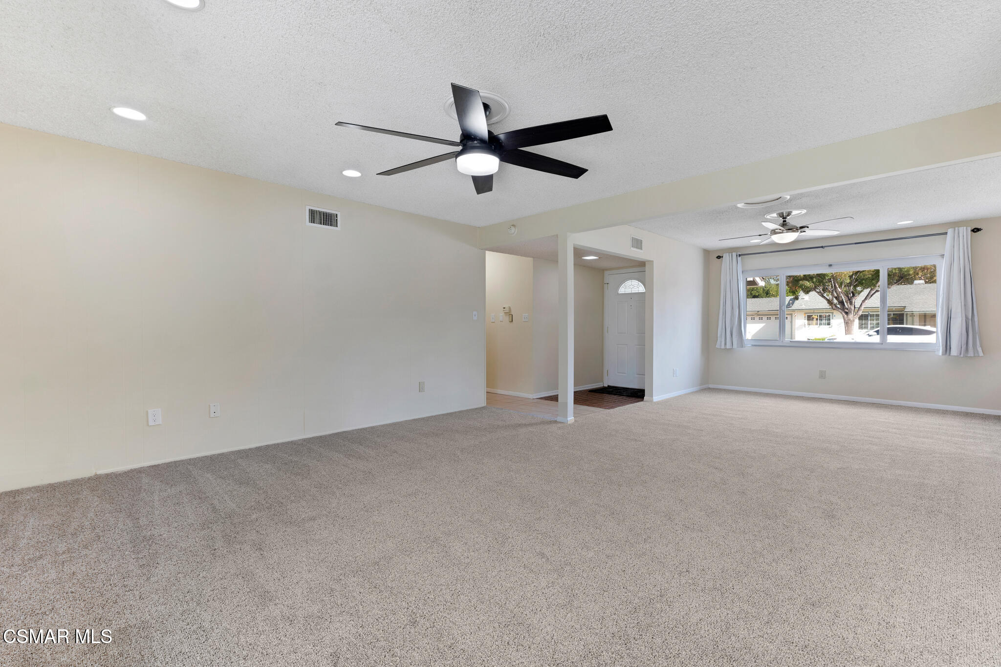 3235 Amarillo Avenue Simi Valley, CA 93063 - Photo 7 of 61 an empty room with windows and fan