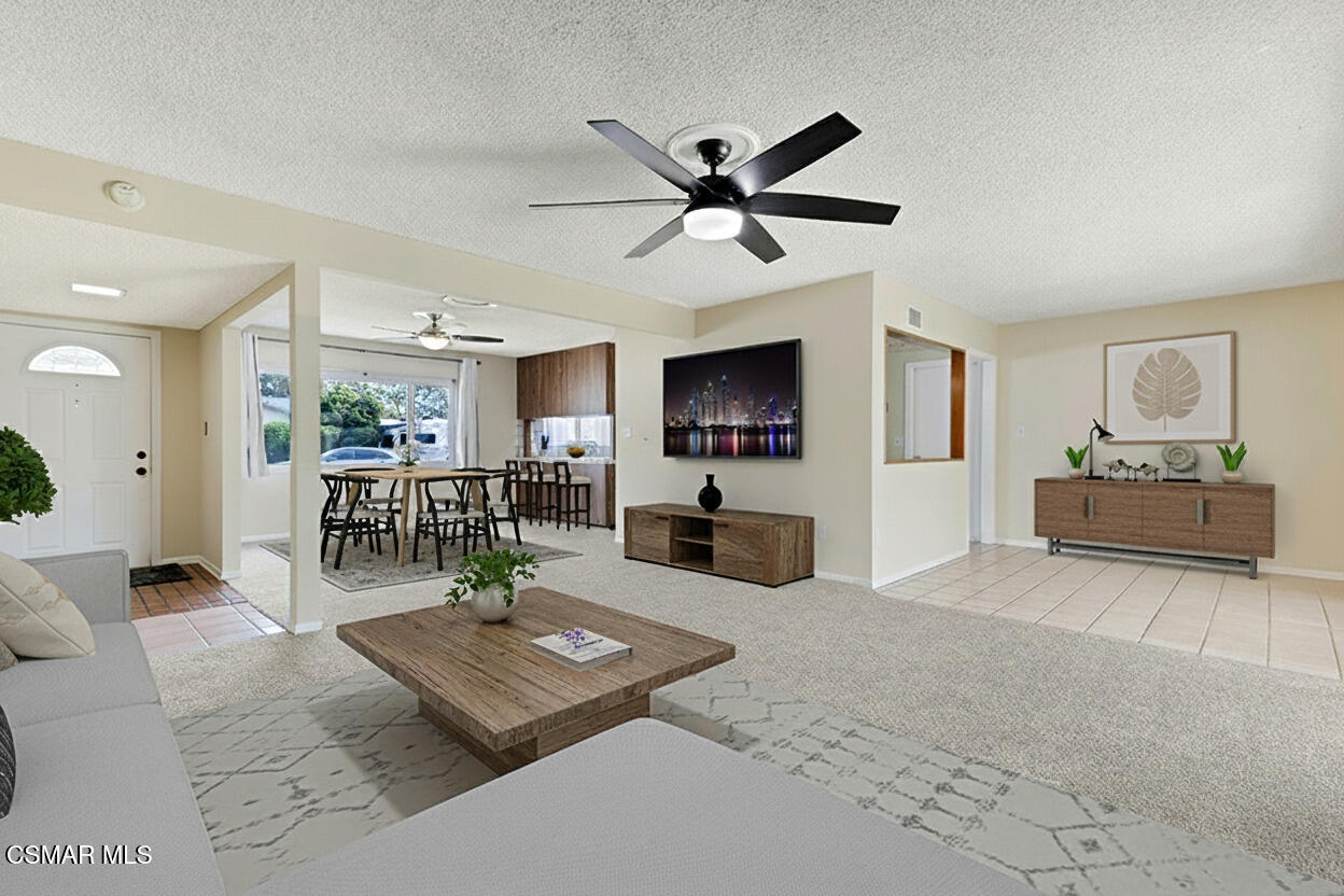 3235 Amarillo Avenue Simi Valley, CA 93063 - Photo 8 of 61 a living room with furniture and a flat screen tv