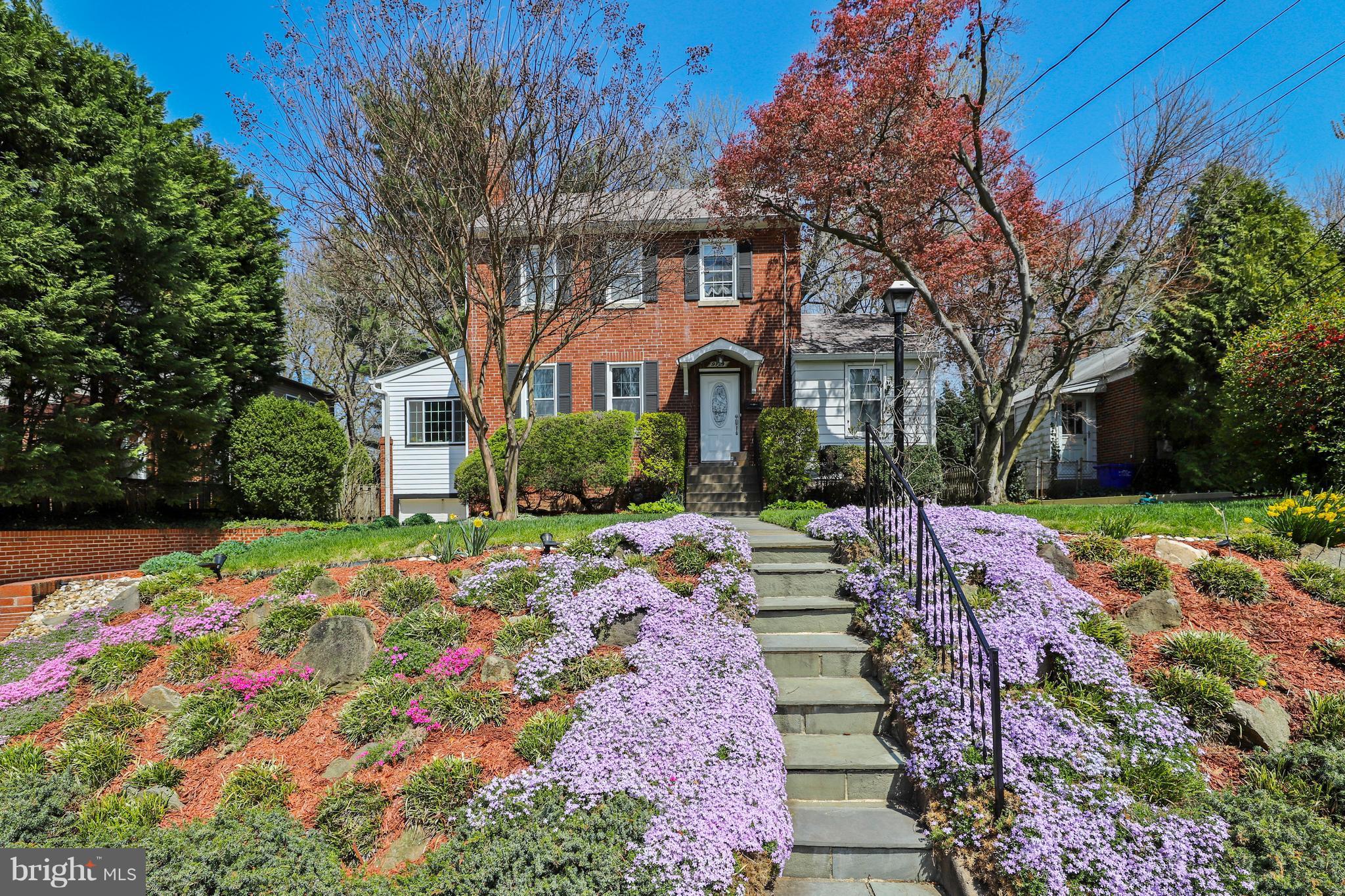 9129 Bradford Road Silver Spring, MD 20901 - Photo 2 of 26 a front view of house with yard