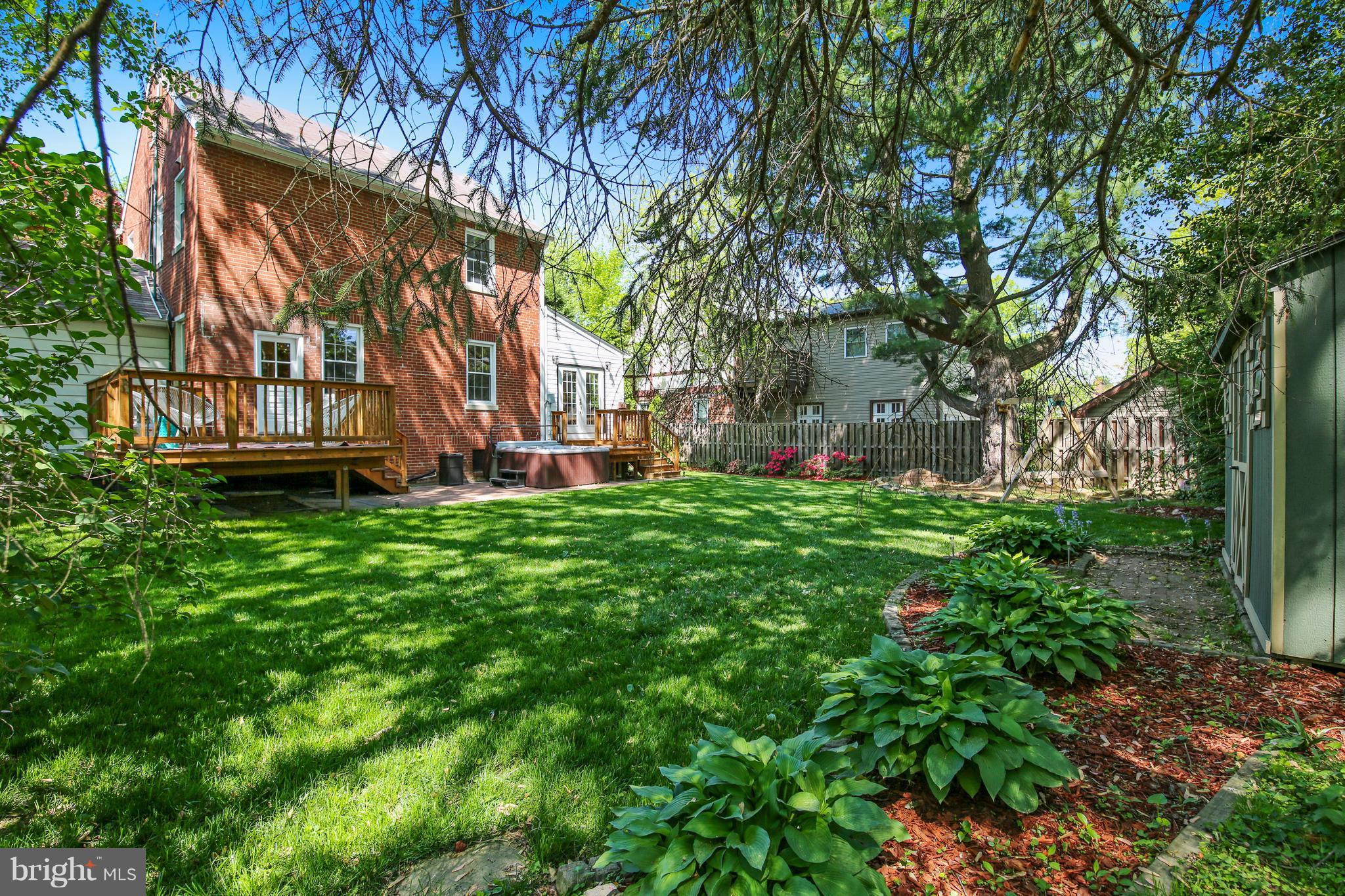 9129 Bradford Road Silver Spring, MD 20901 - Photo 17 of 26 a view of a house with a yard