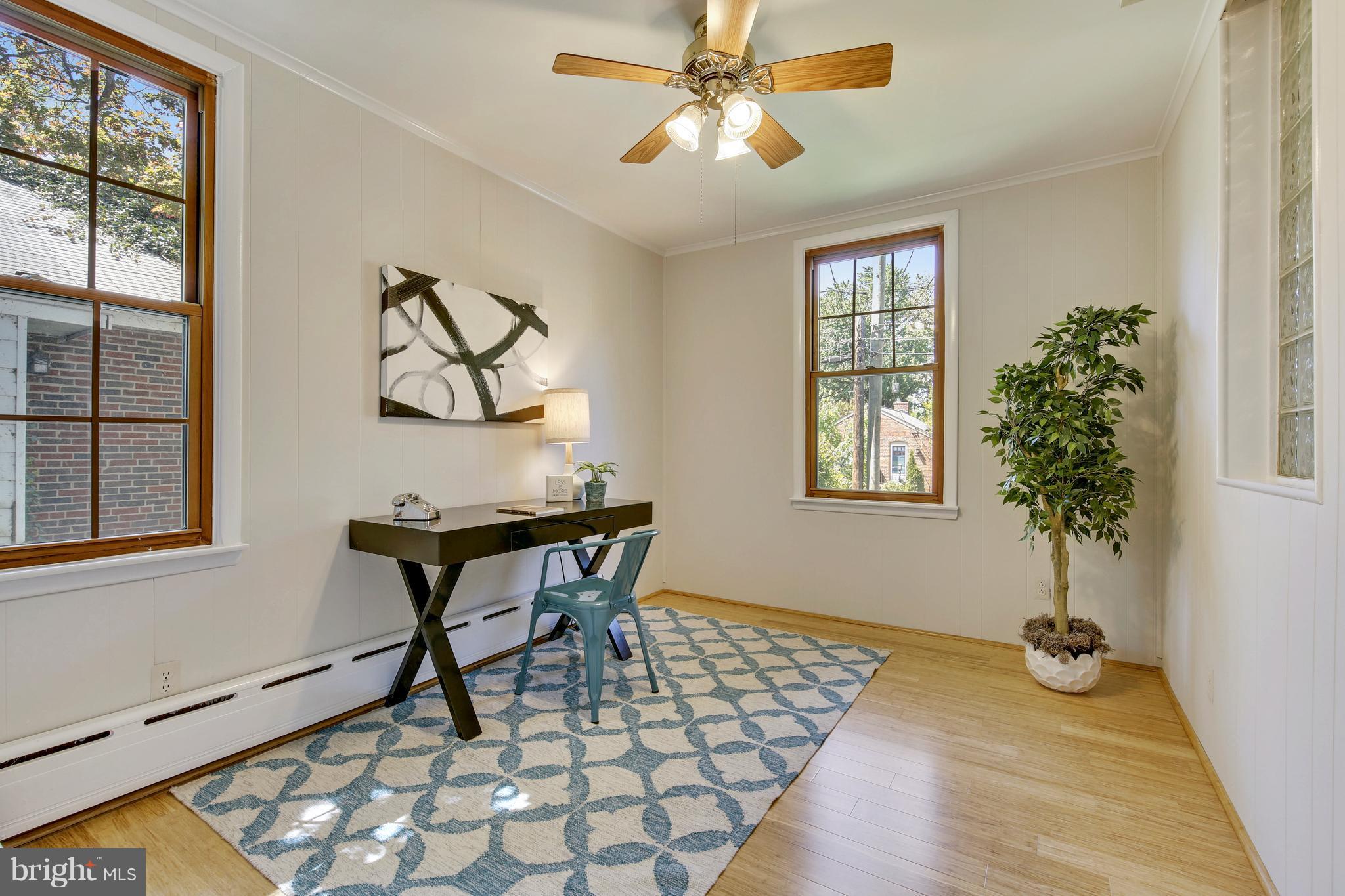9129 Bradford Road Silver Spring, MD 20901 - Photo 19 of 26 a workspace with furniture and window