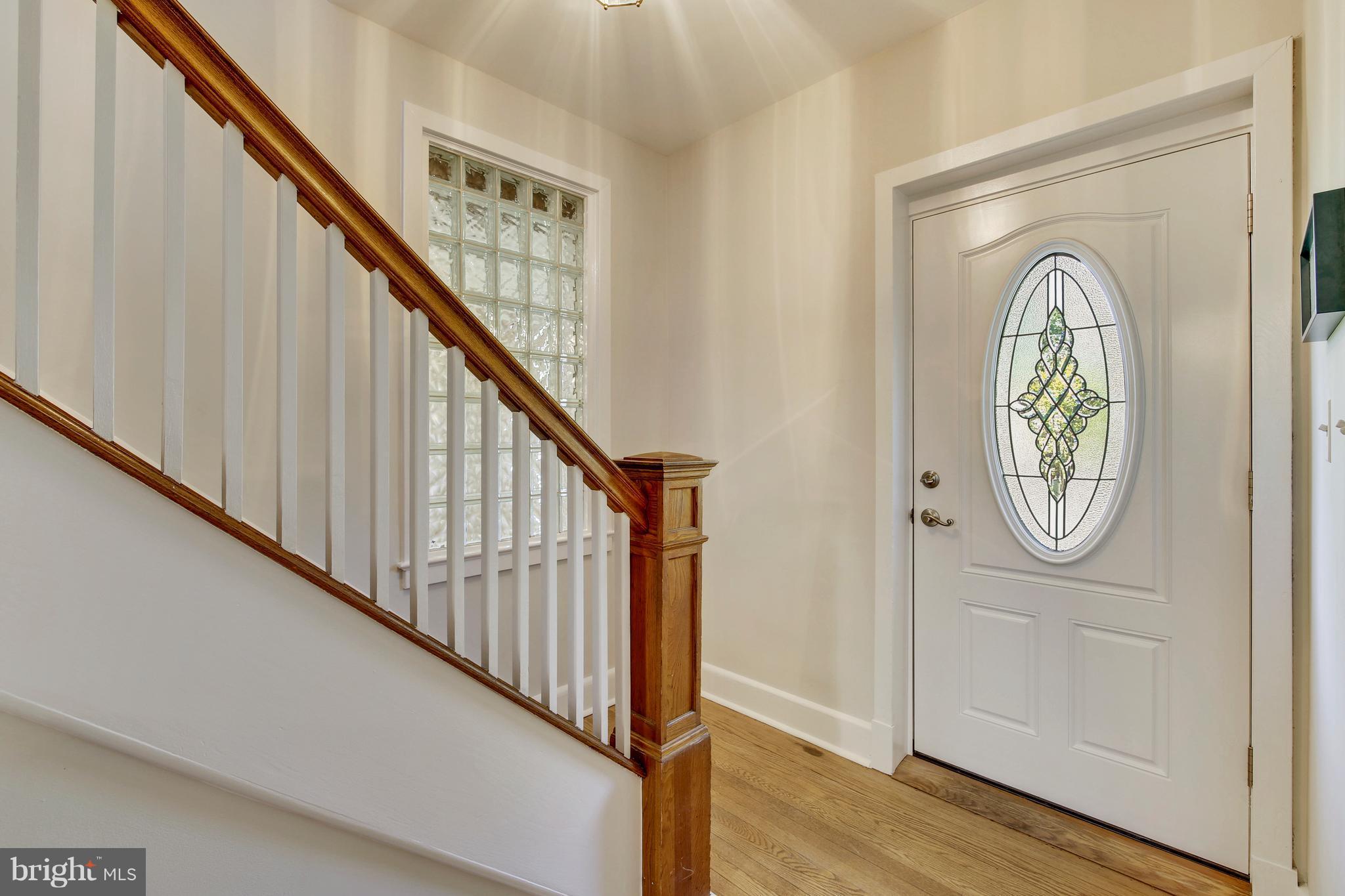 9129 Bradford Road Silver Spring, MD 20901 - Photo 3 of 26 a view of an entryway with wooden floor