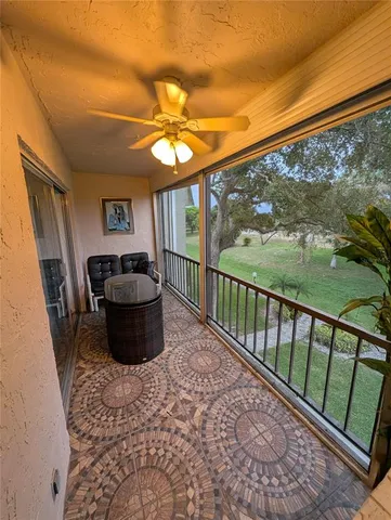 a view of a porch with furniture