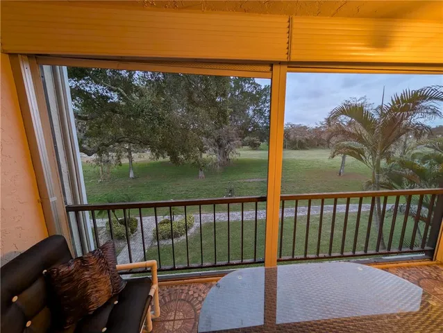 a view of a balcony with couch