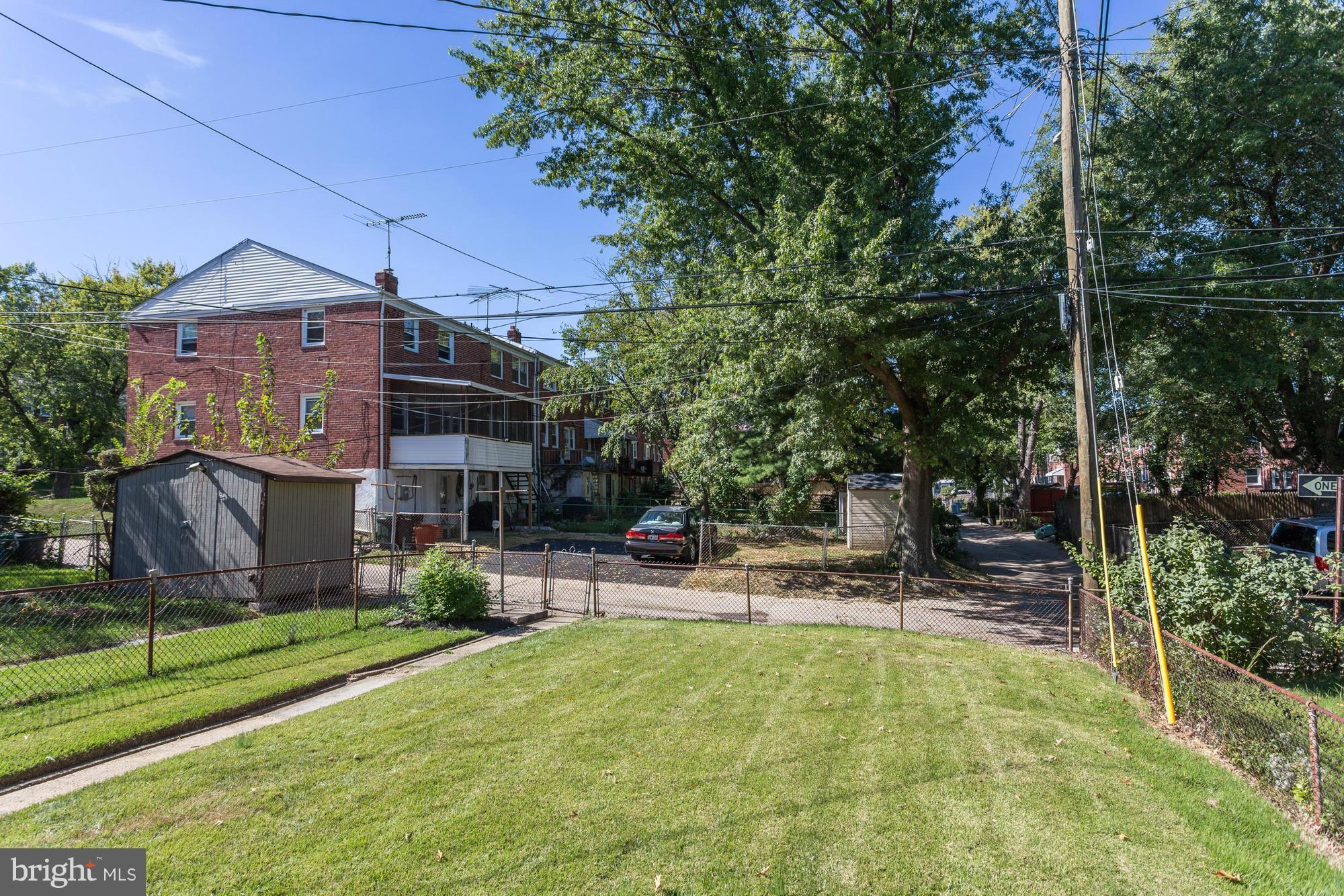 5922 Hillen Road Baltimore, MD 21239 - Photo 23 of 24 a view of a house with garden and sitting area