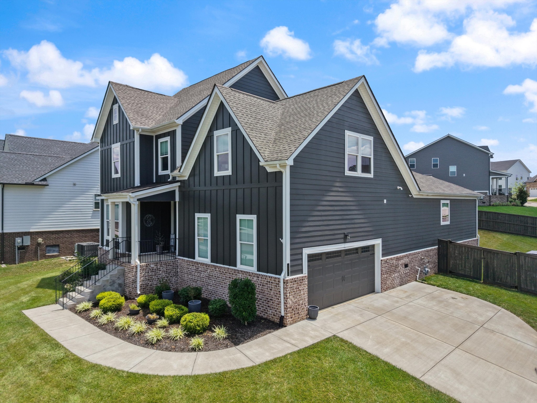 4051 John Marsh Road Spring Hill, TN 37174 - Photo 2 of 46 a front view of a house with a yard