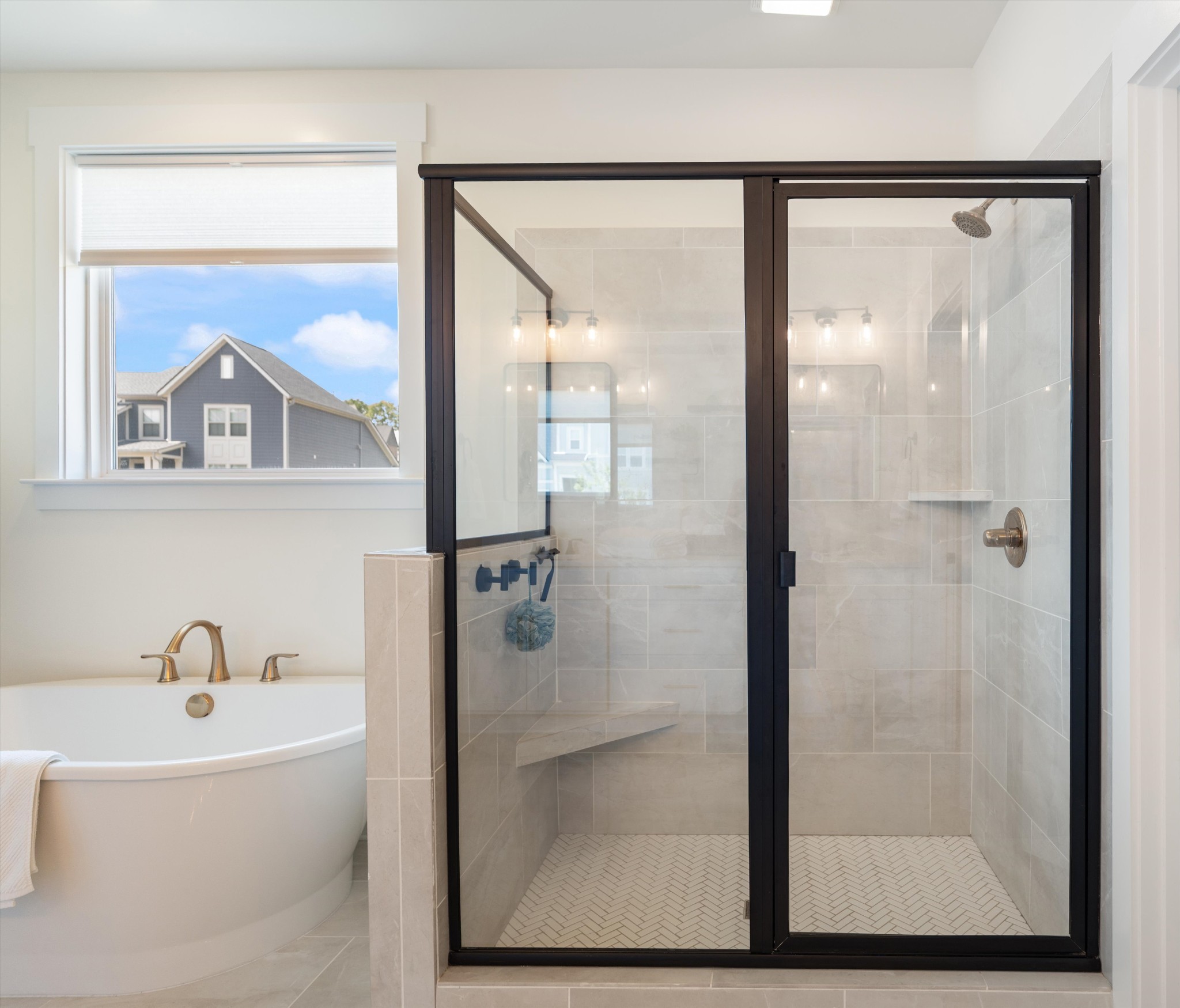 4051 John Marsh Road Spring Hill, TN 37174 - Photo 27 of 46 a bathroom with a bathtub and a shower