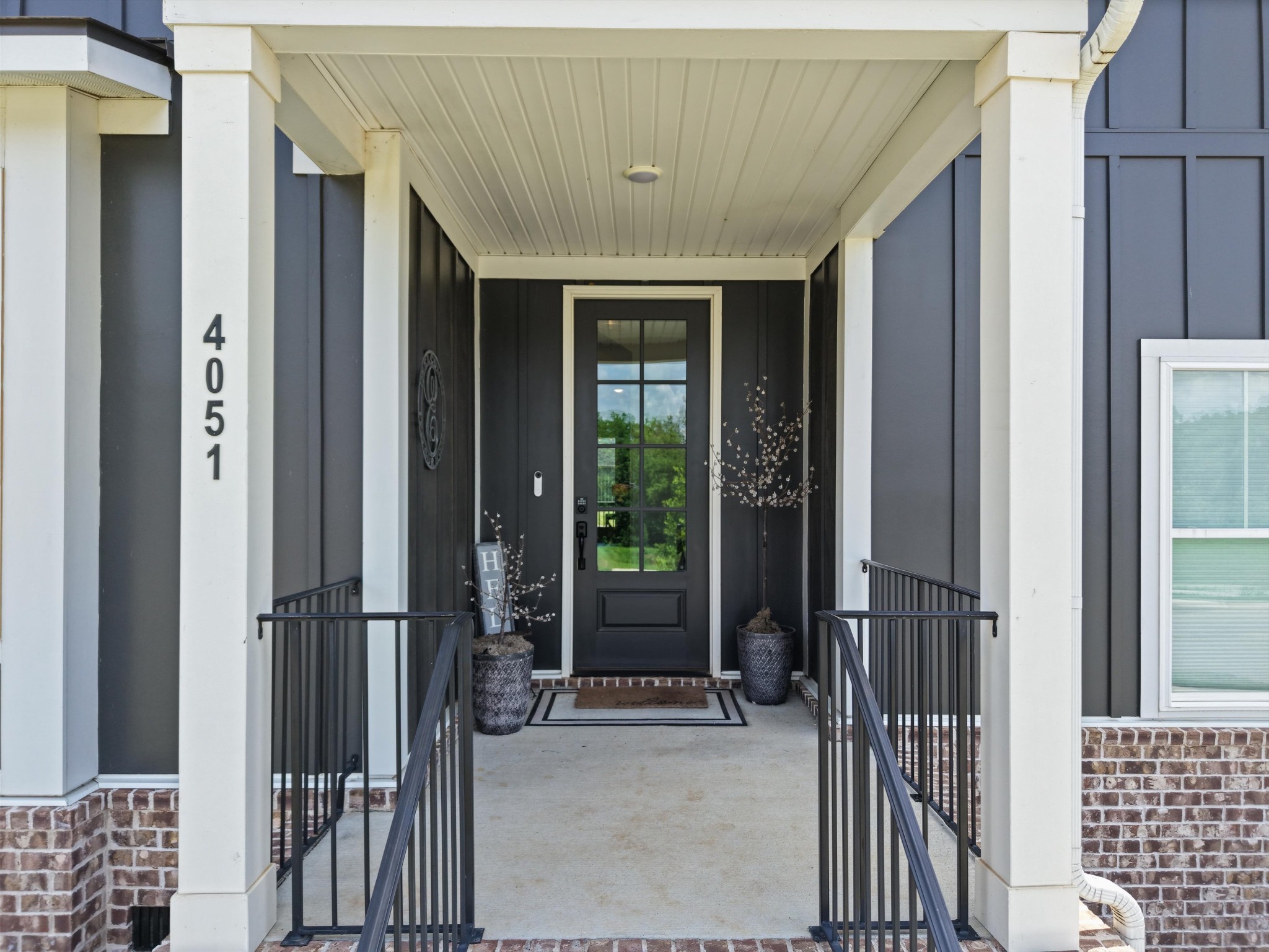 4051 John Marsh Road Spring Hill, TN 37174 - Photo 5 of 46 a view of a porch with a table and chairs