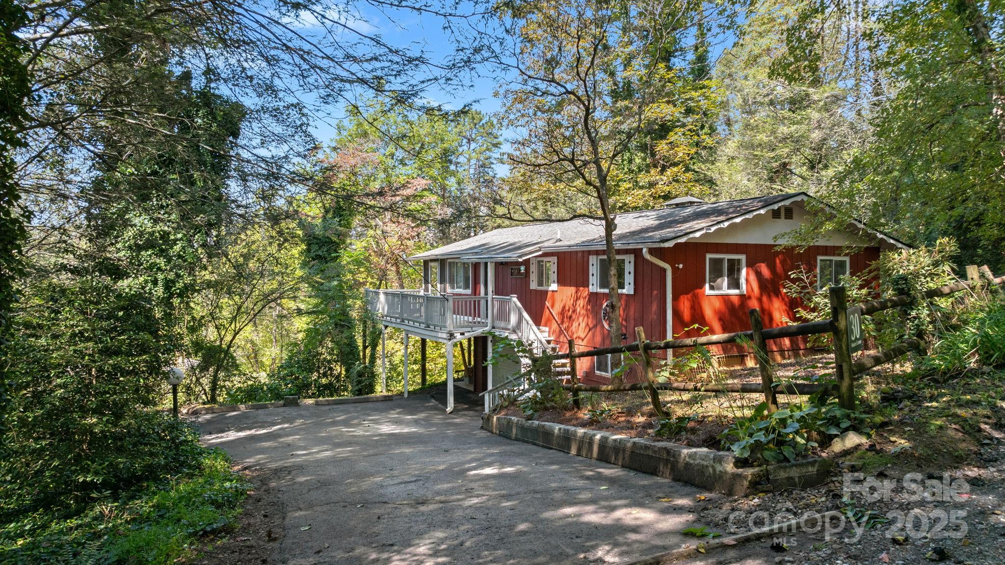 30 Maxies Corner Road Franklin, NC 28734 - Photo 3 of 33 a view of a house with wooden fence