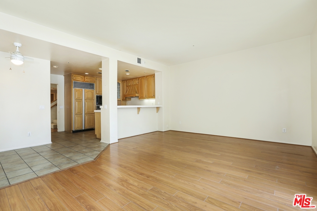 889 C. Amable Glendale, CA 91208 - Photo 19 of 51 a view of a livingroom with wooden floor and a bathroom