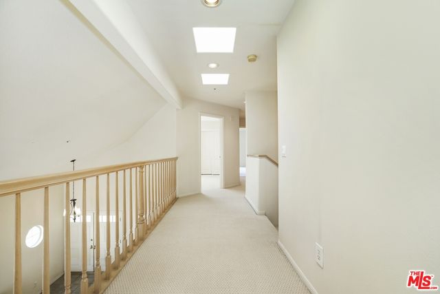 a view of a room with windows