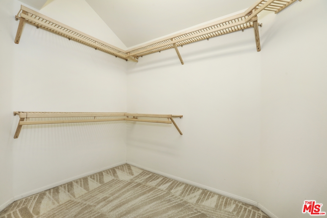 889 C. Amable Glendale, CA 91208 - Photo 28 of 51 a view of a room with racks on the wall