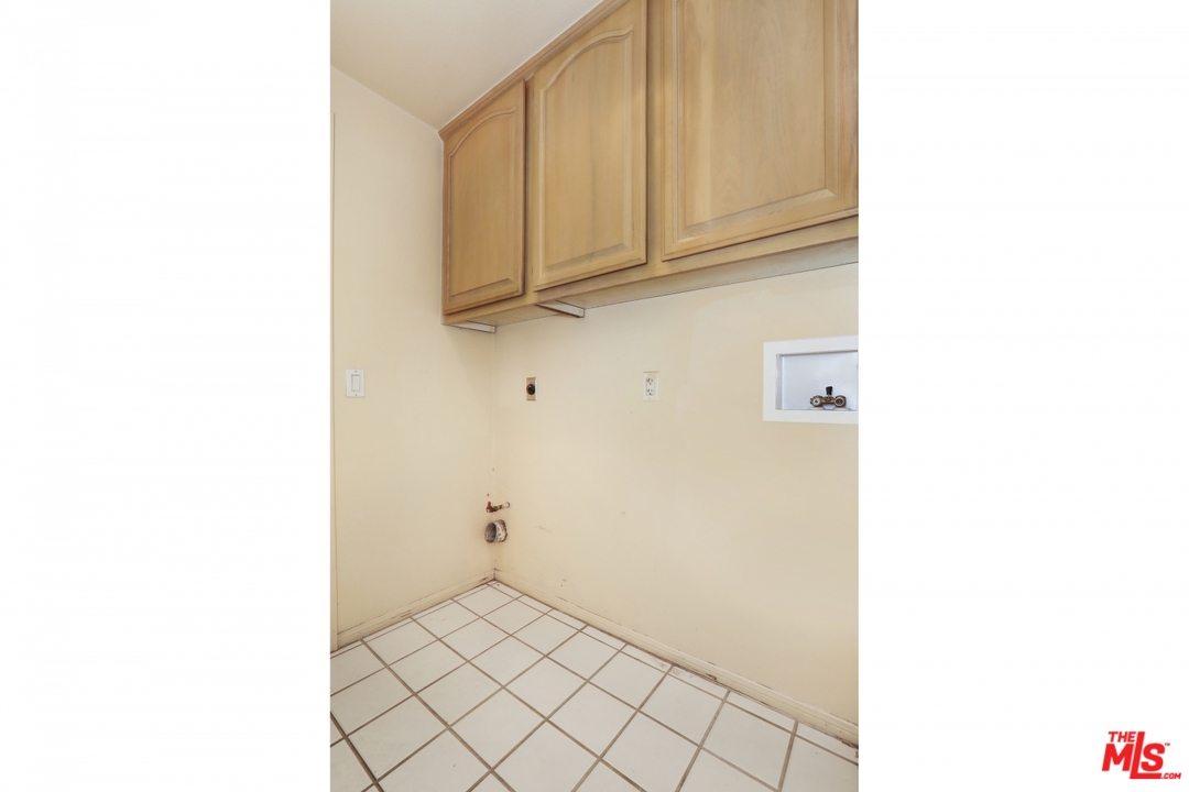 889 C. Amable Glendale, CA 91208 - Photo 37 of 51 a view of a utility room with dryer and washer