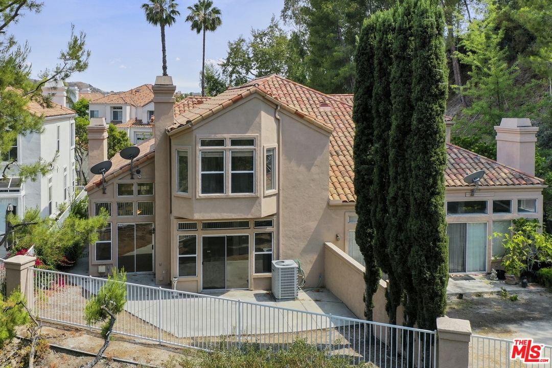 889 C. Amable Glendale, CA 91208 - Photo 45 of 51 a front view of a house with a yard