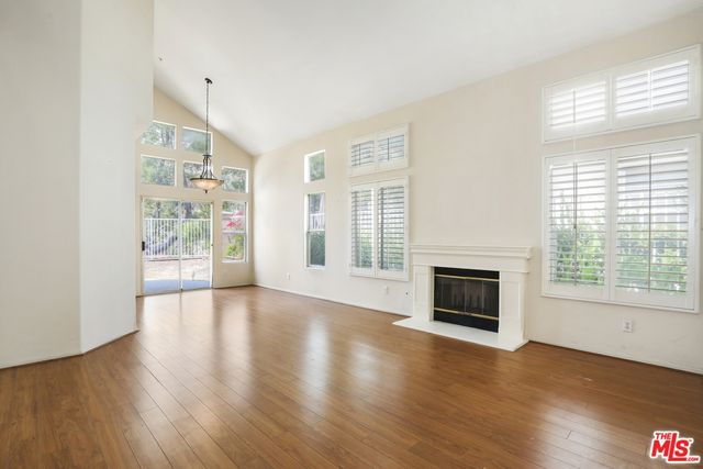 a view of a livingroom with wooden floor