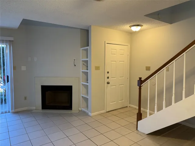 a kitchen with a sink and a stove top oven