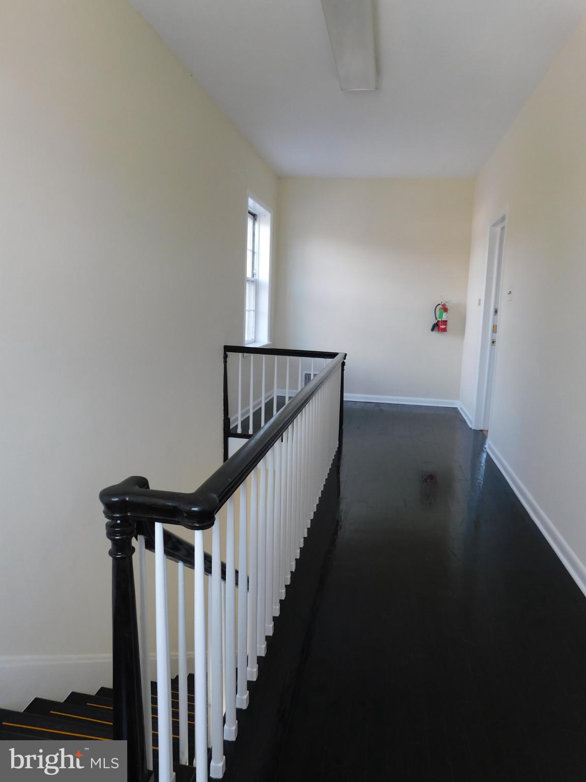 113 West Boscawen Street, Unit 3 Winchester, VA 22601 - Photo 2 of 19 a view of entryway with wooden floor