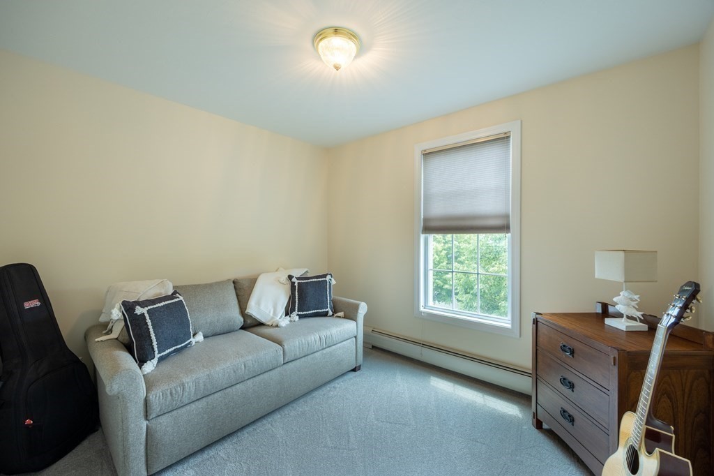3 Harbor Mist Drive, Unit 3 Fairhaven, MA 02719 - Photo 19 of 28 a living room with furniture and a window