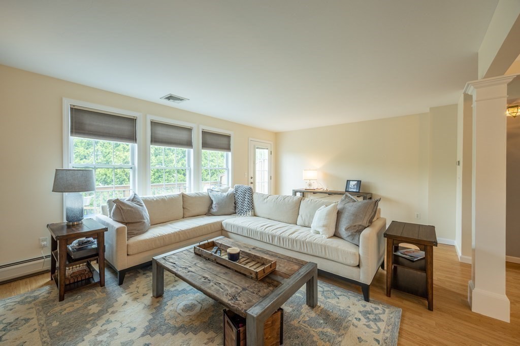 3 Harbor Mist Drive, Unit 3 Fairhaven, MA 02719 - Photo 8 of 28 a living room with furniture and a window