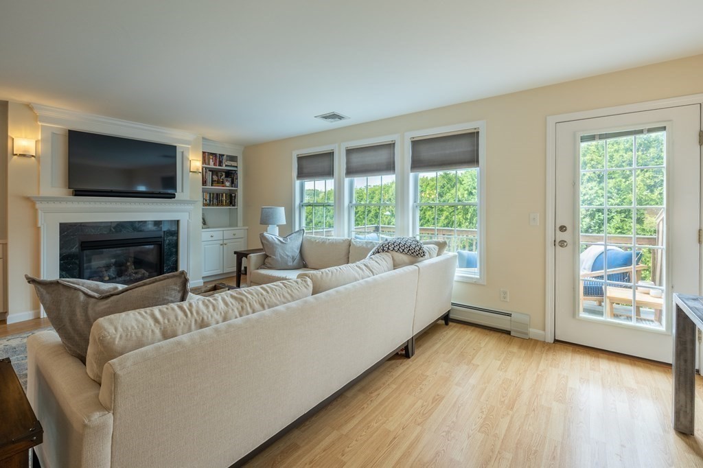 3 Harbor Mist Drive, Unit 3 Fairhaven, MA 02719 - Photo 9 of 28 a living room with furniture and a flat screen tv