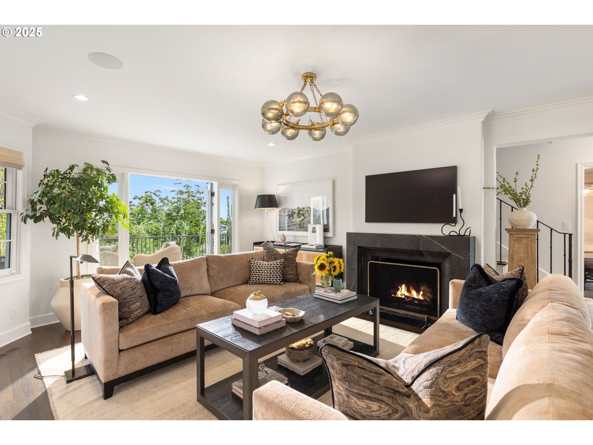 604 Northwest MacLeay Boulevard Portland, OR 97210 - Photo 16 of 46 a living room with furniture a fireplace and a flat screen tv
