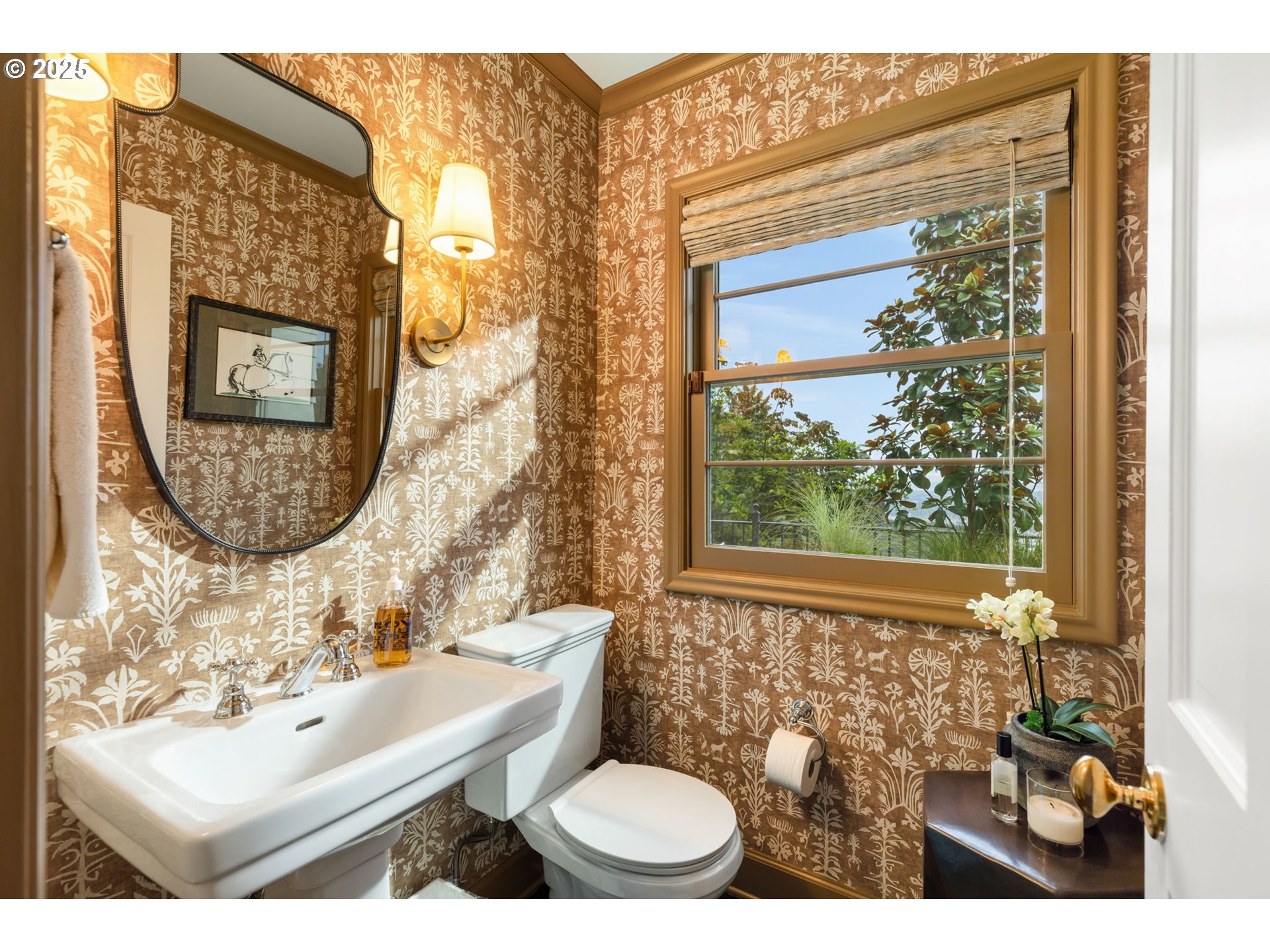 604 Northwest MacLeay Boulevard Portland, OR 97210 - Photo 32 of 46 a bathroom with a toilet a sink and a mirror
